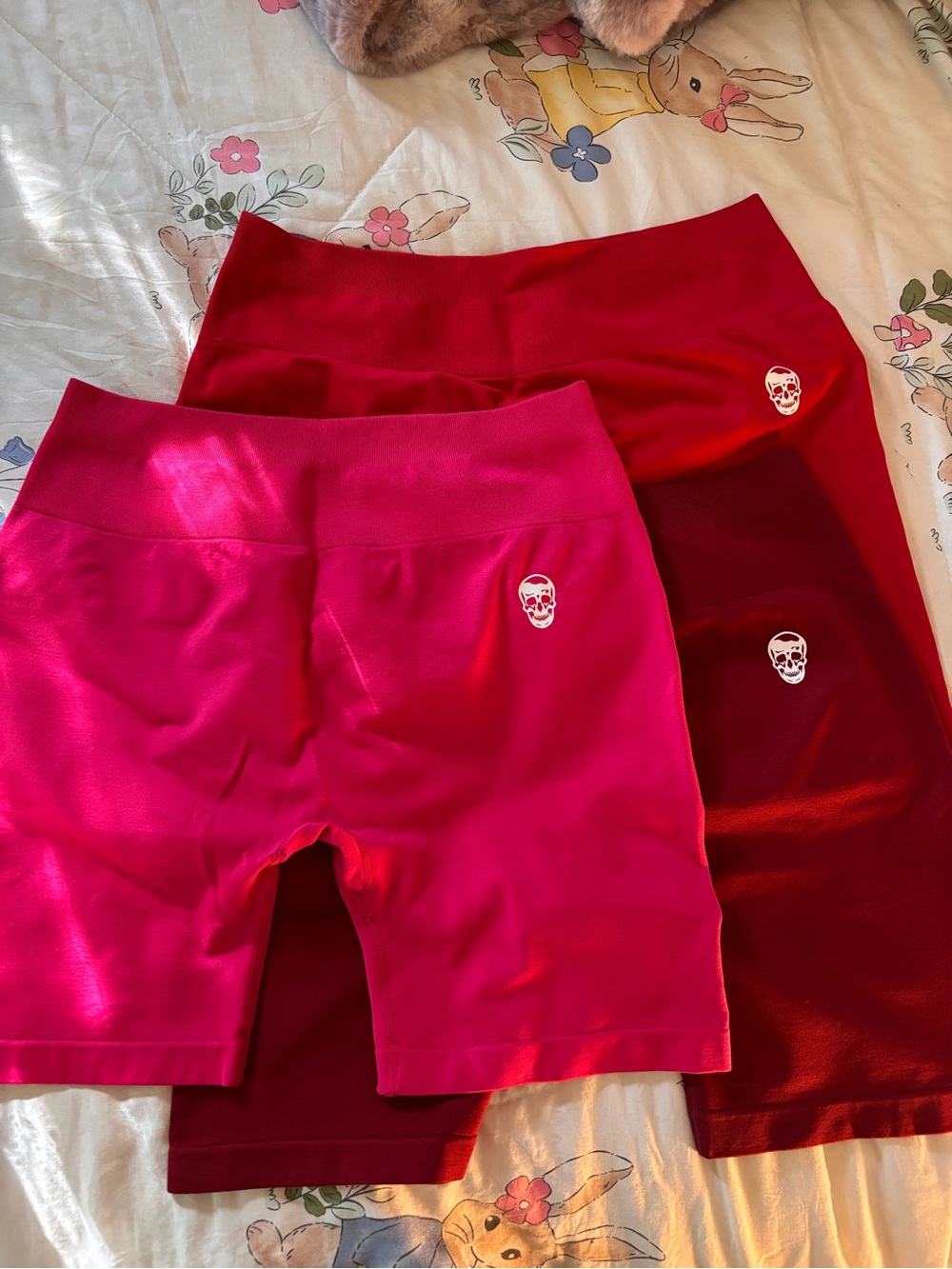 Women's Skull-Accent Athletic Bike Shorts in Hot Pink and Red
